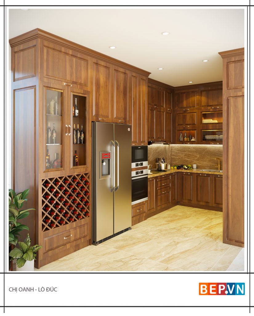 Thiết kế tủ bếp ốp trần chữ U sử dụng chất  liệu gỗ Hương ấm cúng và sang trọng.  Một thiết kế có tính thống nhất từ tủ bếp đến bàn đá và tường chắn bếp  đem lại giá trị thẩm mỹ cho toàn bộ không gian 