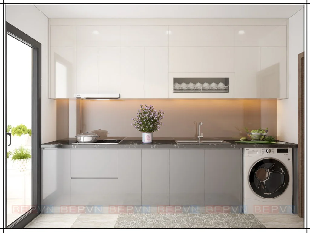 thiết kế tủ bếp lựa chọn gam màu xám nhạt liền khối