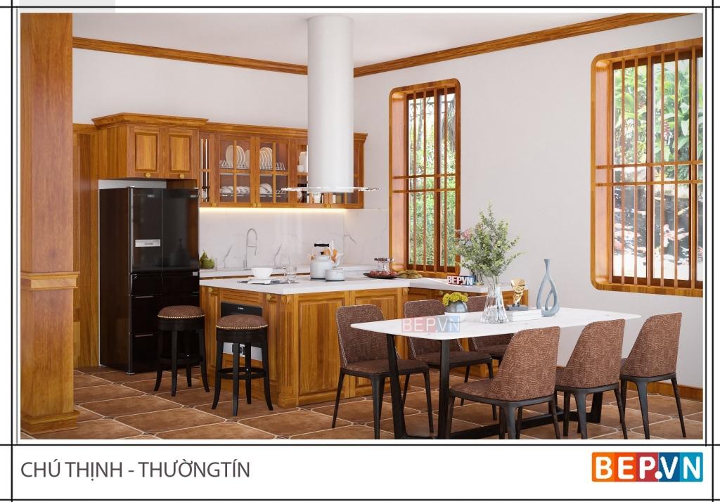 Mẫu tủ bếp gỗ gõ đỏ tự nhiên sang trọng của gia đình anh Thịnh