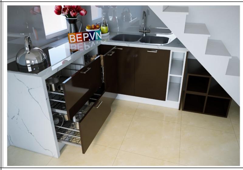 Tủ bếp Acrylic màu cafe dưới chân cầu thang