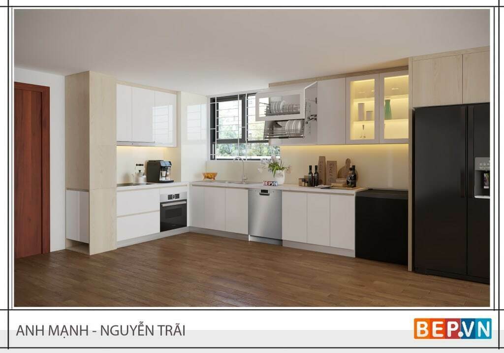 Màu sắc tủ bếp được kết hợp hài hòa giữa vân gỗ sồi và màu trắng bóng chống chịu trầy xước.