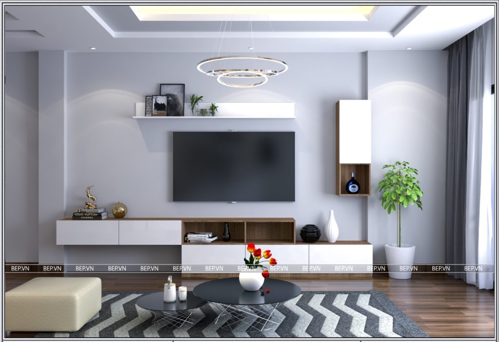 Kệ tivi với hệ tủ cả trên và dưới nhẹ nhàng đảm nhiệm chức năng trang trí